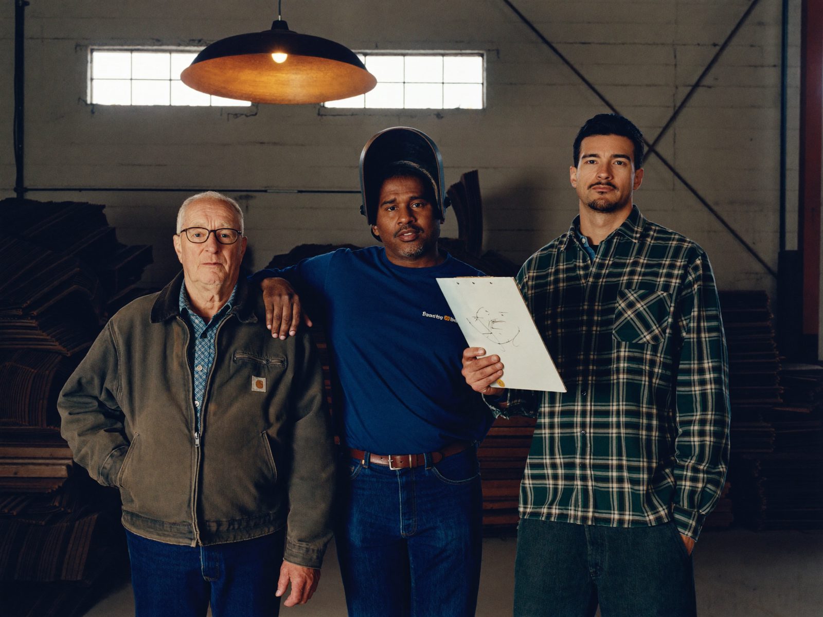 Three generations of Ironhold fabricators standing in the yard